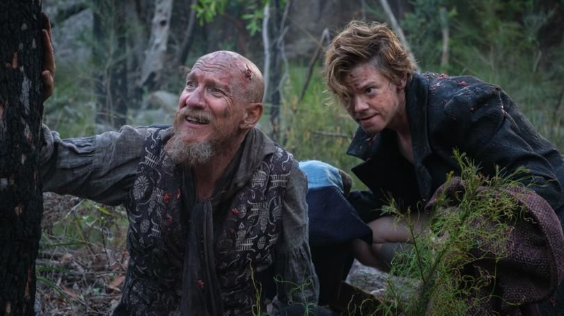 David Thewlis as Fagin and Thomas Brodie-Sangster as Jack Dawkins in The Artful Dodger