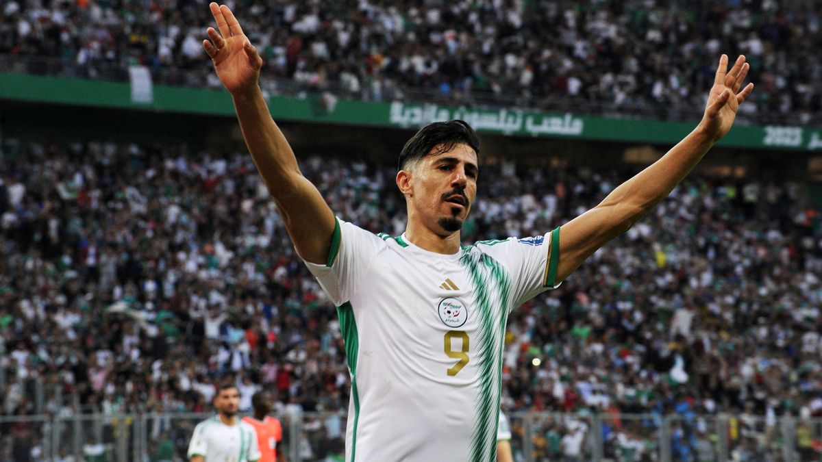 Baghdad Bounedjah (pictured) celebrates a goal ahead of the Algeria vs Angola live stream