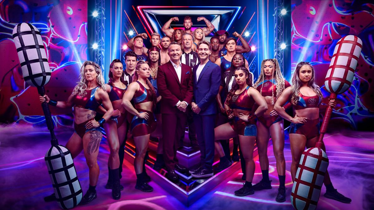 Presenters Bradley and Barney Walsh posing with the Gladiators