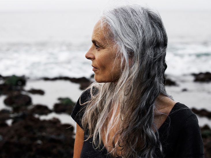Older female by the ocean