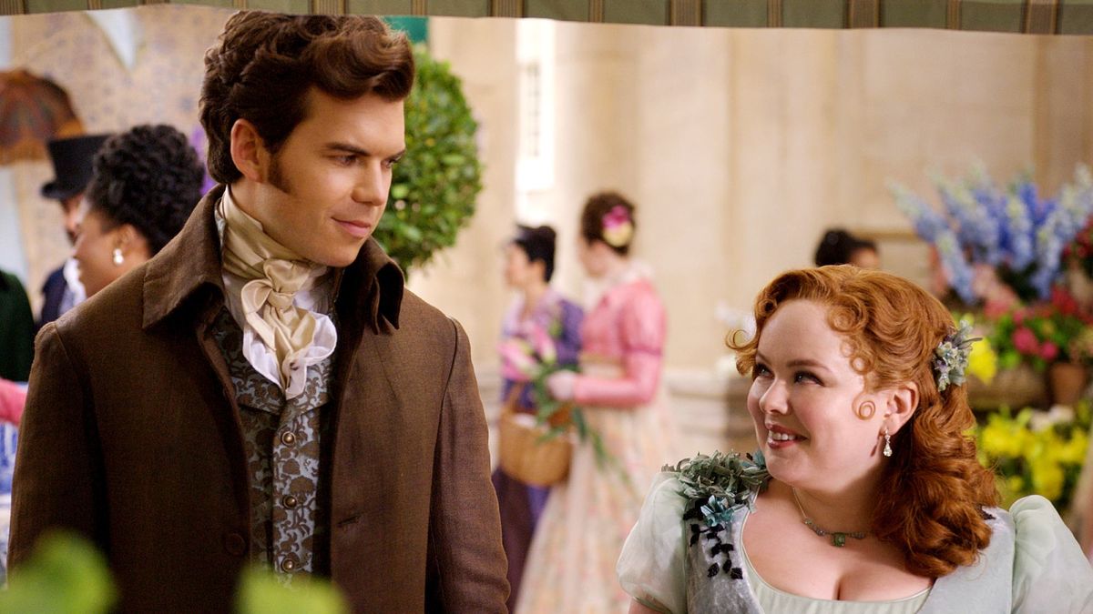 (L to R) Luke Newton as Colin Bridgerton, Nicola Coughlan as Penelope Featherington in Bridgerton