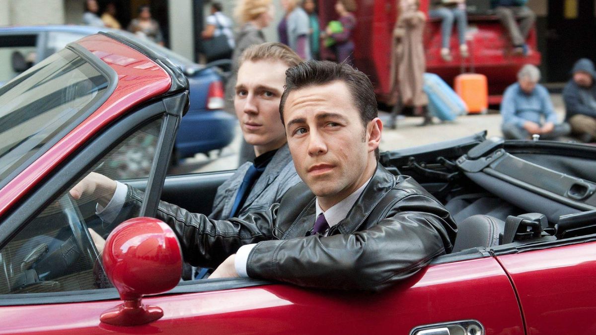 Paul Dano and Joseph Gordon-Levitt in a red car in Looper