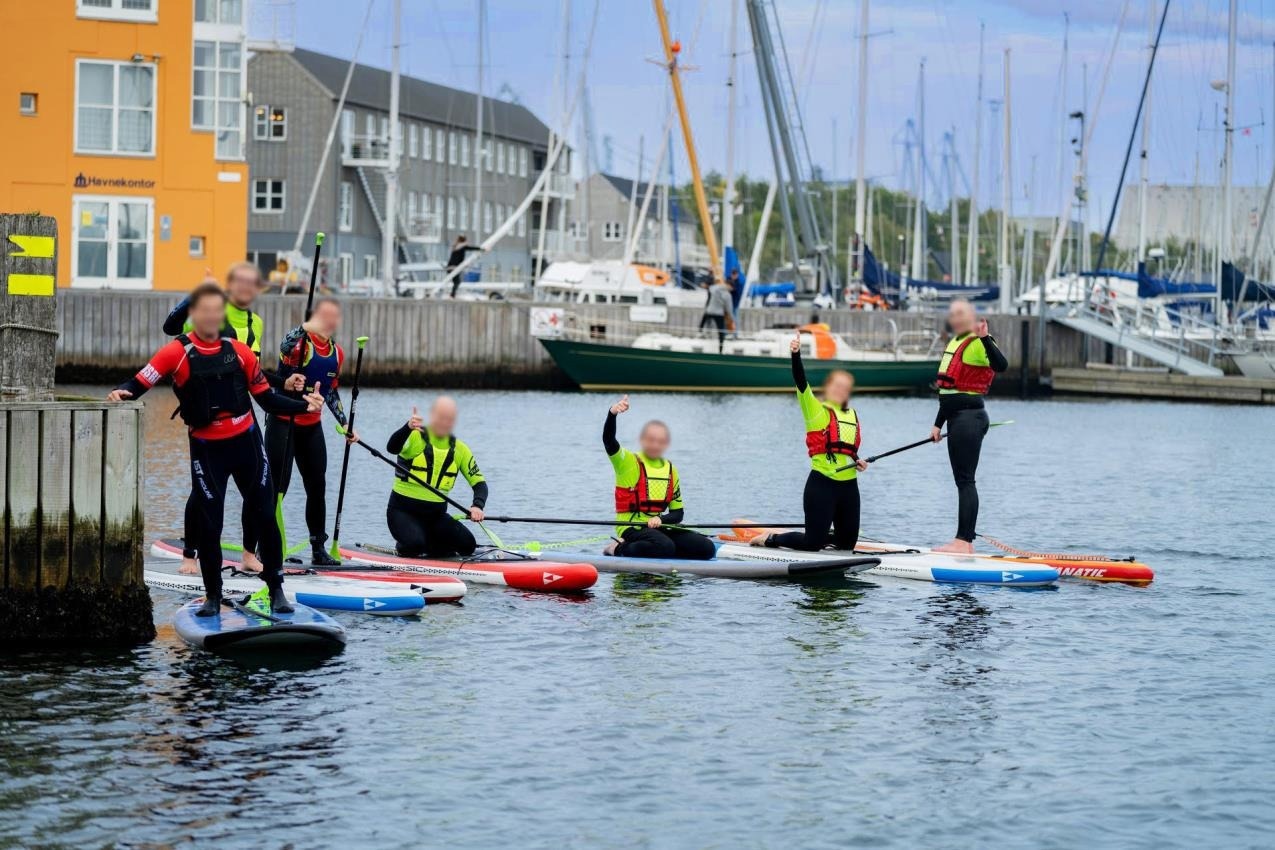 SUP activity, used with permission from Surf & SUP Denmark (Photo: Jakob Gjerluff, Gjerluff Photography). Study: Two-and-a-Half-Year Follow-up Study with Freedom on Water through Stand-up Paddling: Exploring Experiences in Blue Spaces and Their Long-Term Impact on Mental Well-Being