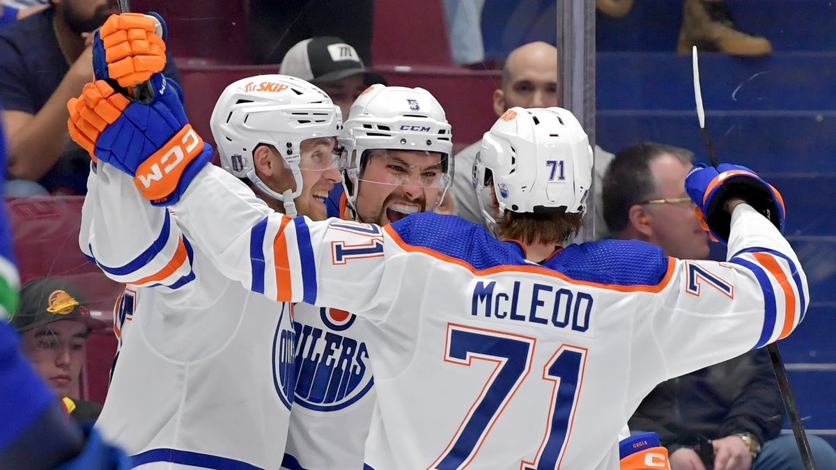 Cody Ceci #5 of the Edmonton Oilers (C) celebrates with teammates after his goal during the second period in Game Seven of the Second Round of the 2024 Stanley Cup Playoffs at Rogers Arena on May 20, 2024