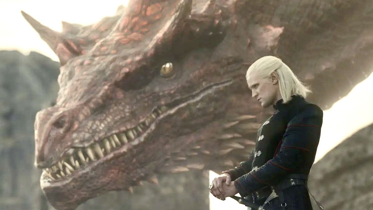 Prince Daemon (Matt Smith) stands next to Caraxes in