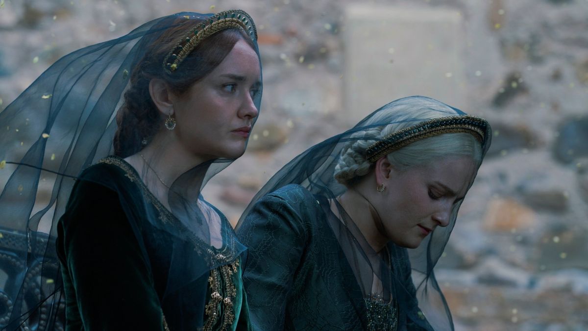 Alicent (Olivia Cooke) and Helaena (Phia Saban) dressed in funeral attired in