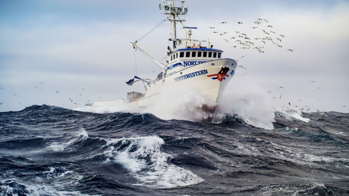 Fishing vessel the F/V Northwestern cuts through rough seas in