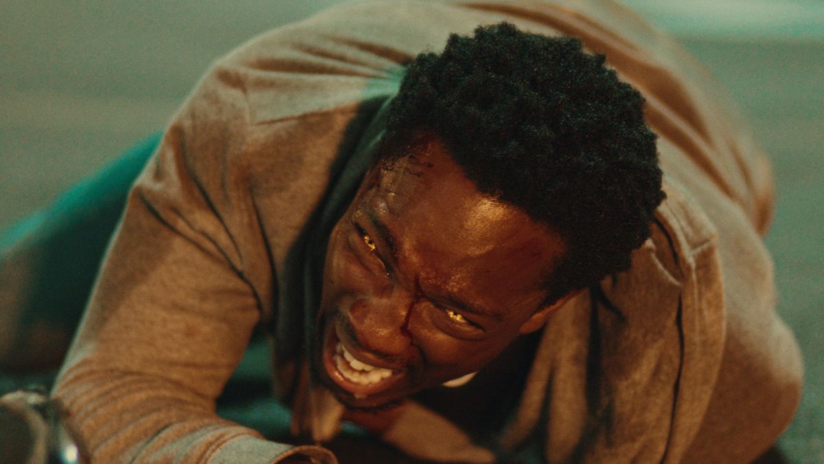 Tosin Cole screaming on the floor in Netflix