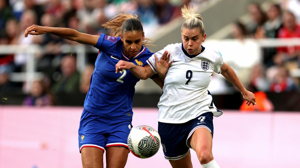 Maelle Lakrar and Alessia Russo fight for the ball during the UEFA Women