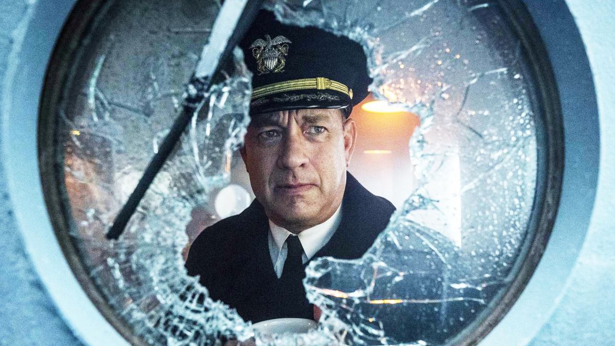 Tom Hanks staring through a broken window in