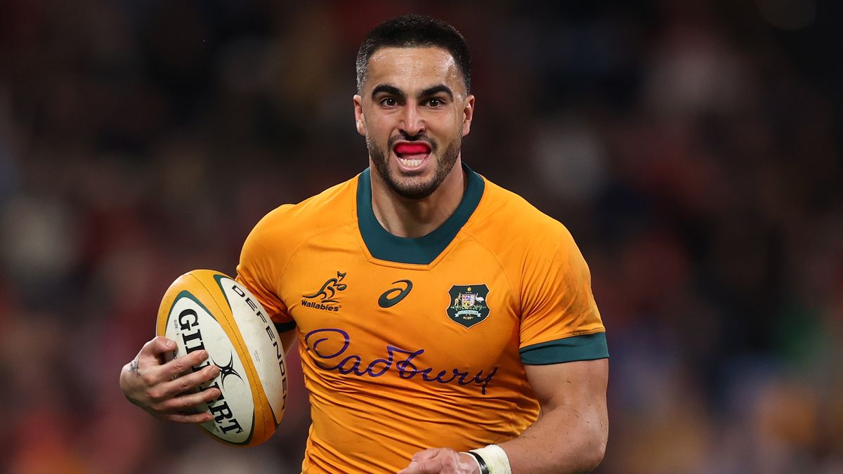 Tom Wright of the Wallabies runs the ball ahead of the Australia vs Wales live stream – rugby Summer Internationals 2024 second Test.