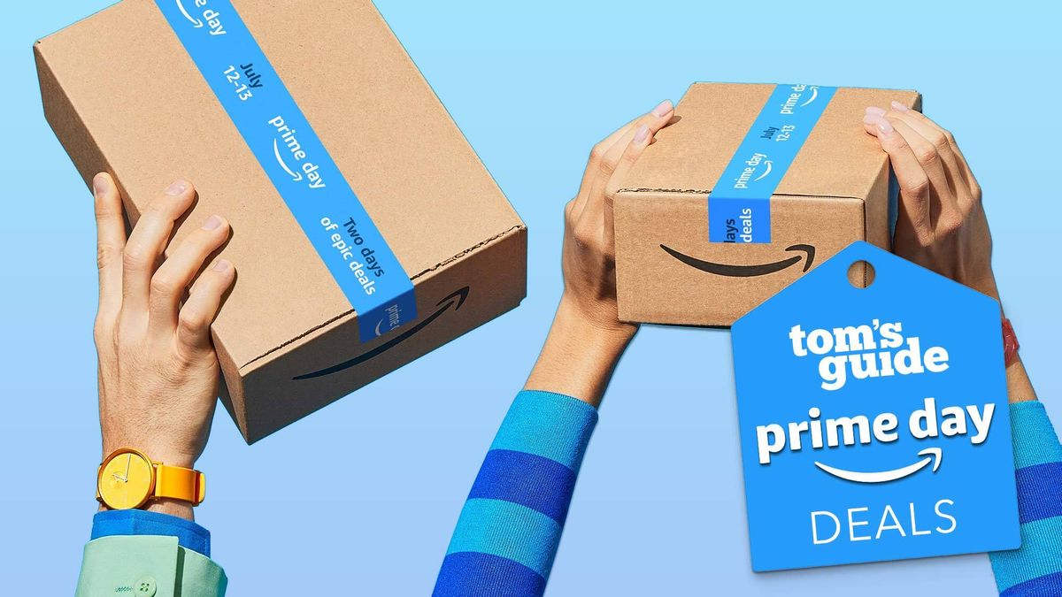 Hands hold Amazon packages bearing Prime Day tape
