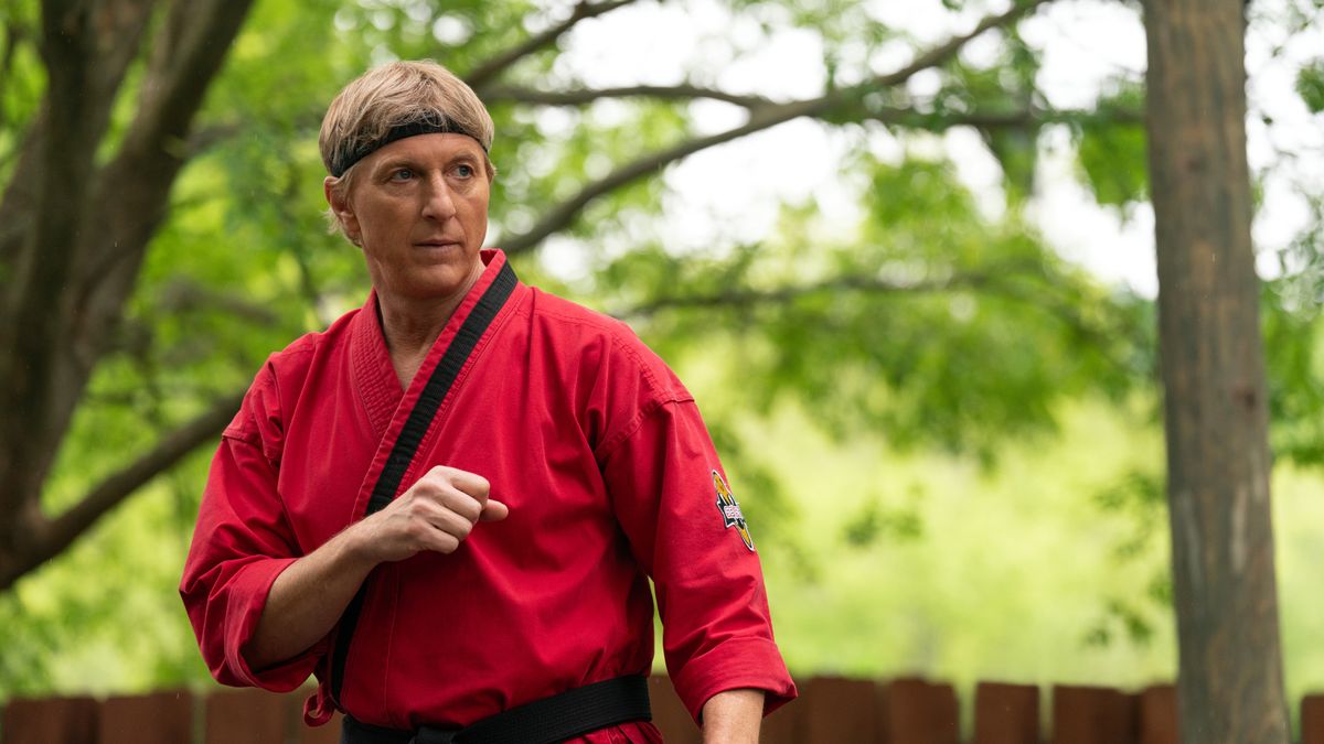 William Zabka in red kung fu attire in