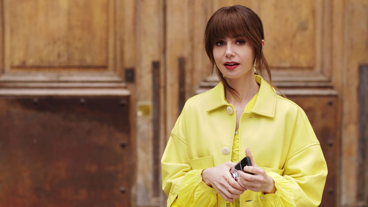 Emily (Lily Collins) wearing a yellow shirt in