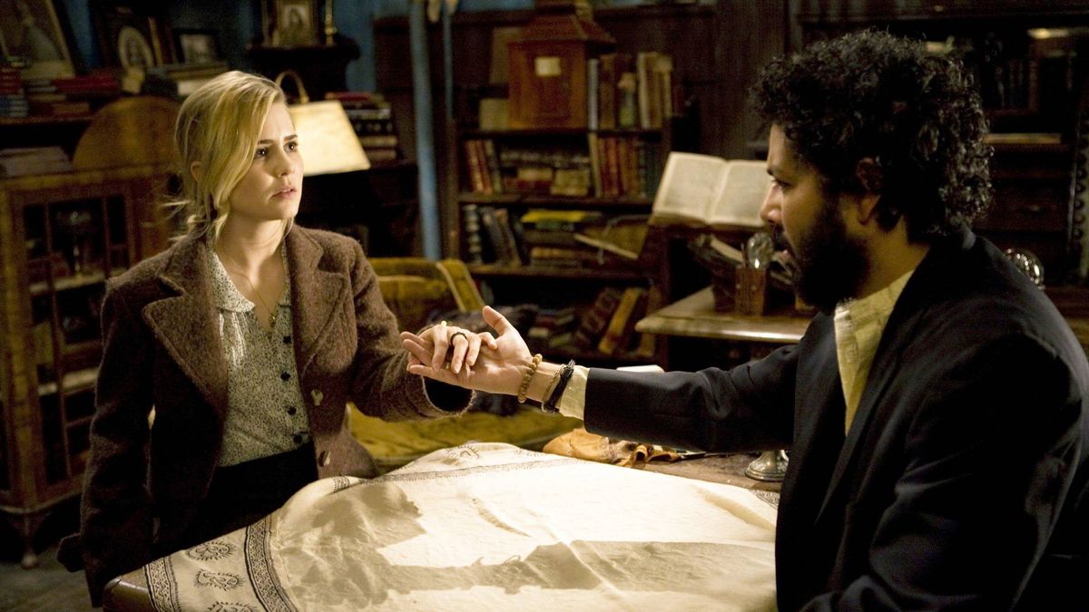 (L-R) Alison Lohman as Christine Brown and Dileep Rao as Rham Jas in "Drag Me to Hell"