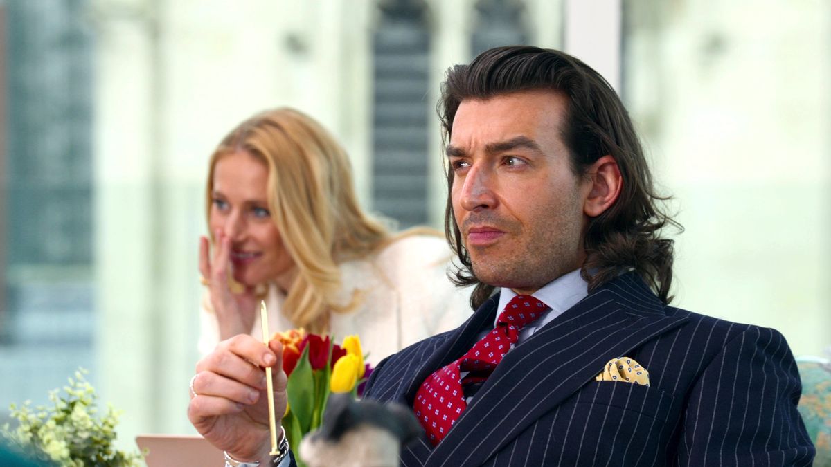 Two realtors seen in Netflix's "Buying London"