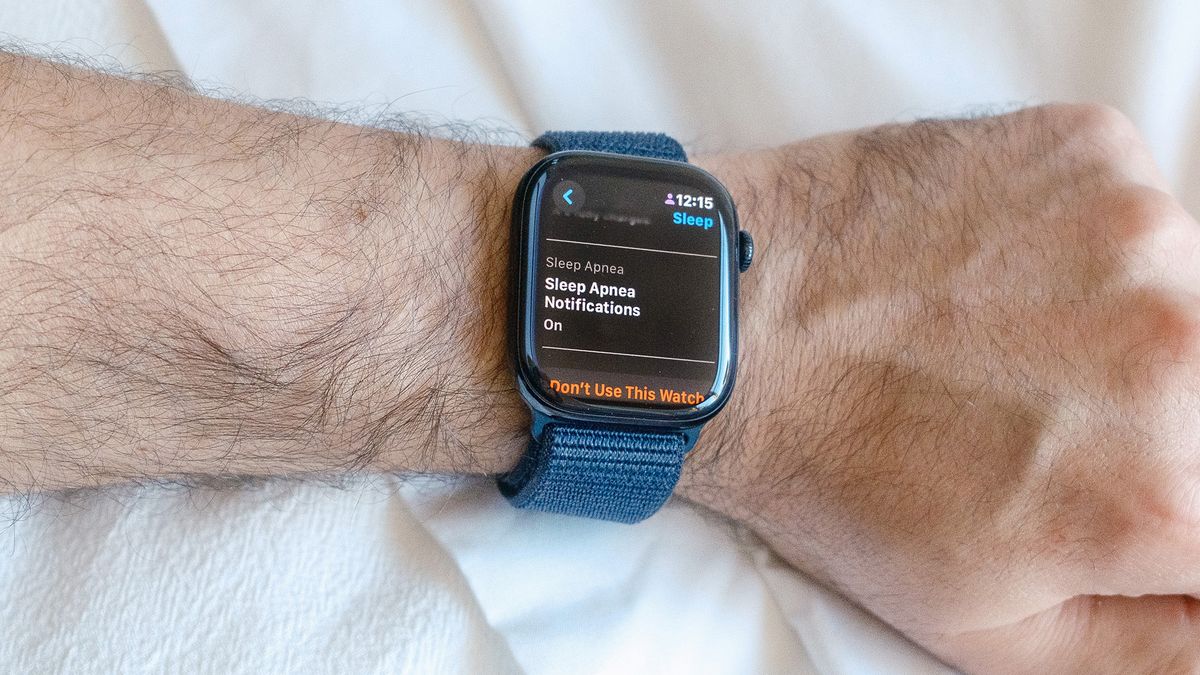 Close-up of an Apple Watch 10 on a user's wrist with the screen showing that the sleep apnea safety feature is switched on