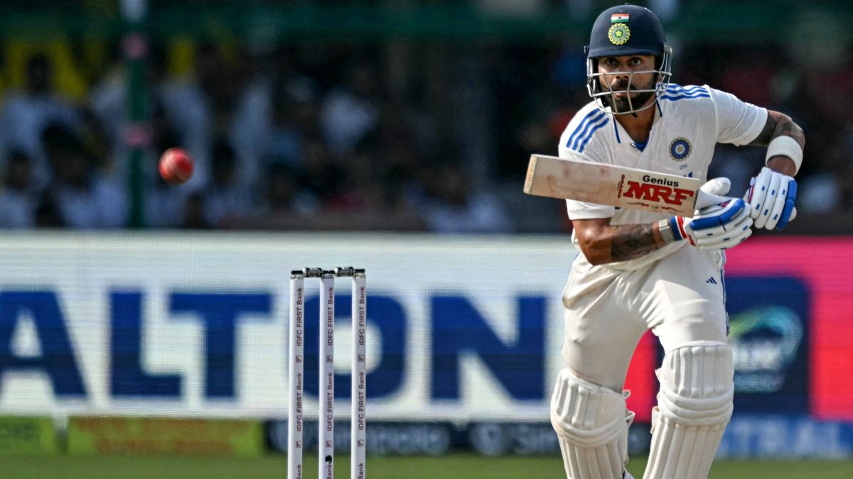 India's Virat Kohli watches the ball after playing a shot during the fourth day of the second Test cricket match between India and Bangladesh at the Green Park Cricket Stadium in Kanpur on September 30, 2024.