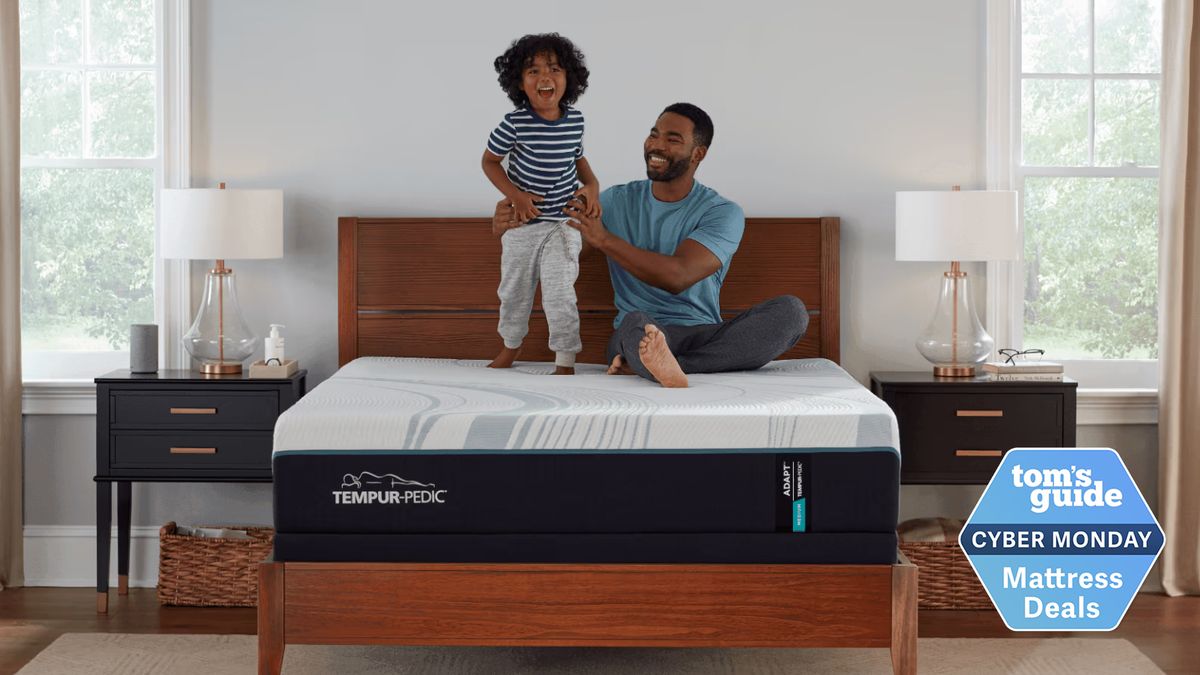 Dad and son playing on a Tempur-Pedic mattress in a bedroom, with a badge saying:
