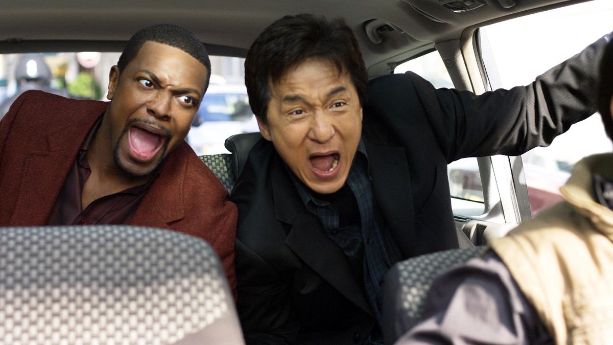 Chris Tucker and Jackie Chan (L-R) screaming in the back seat of a car in "Rush Hour" 3