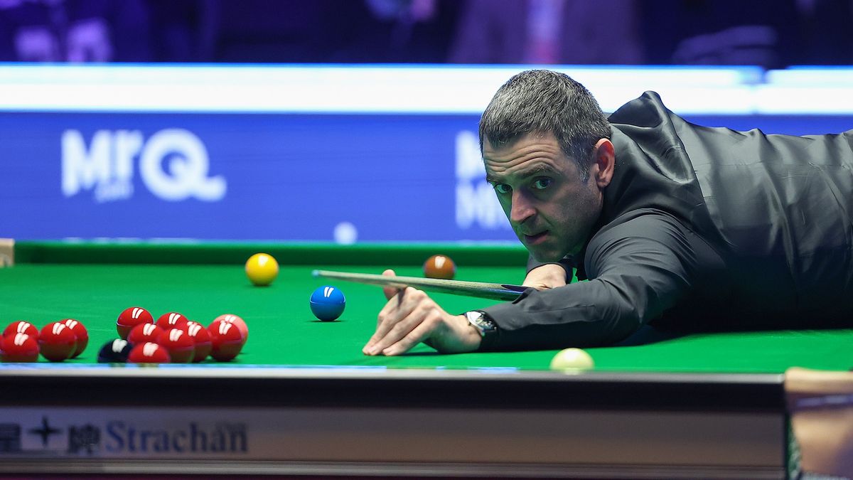 "The Rocket" Ronnie O'Sullivan of England lines up a shot for the Masters snooker 2025 in London, England.