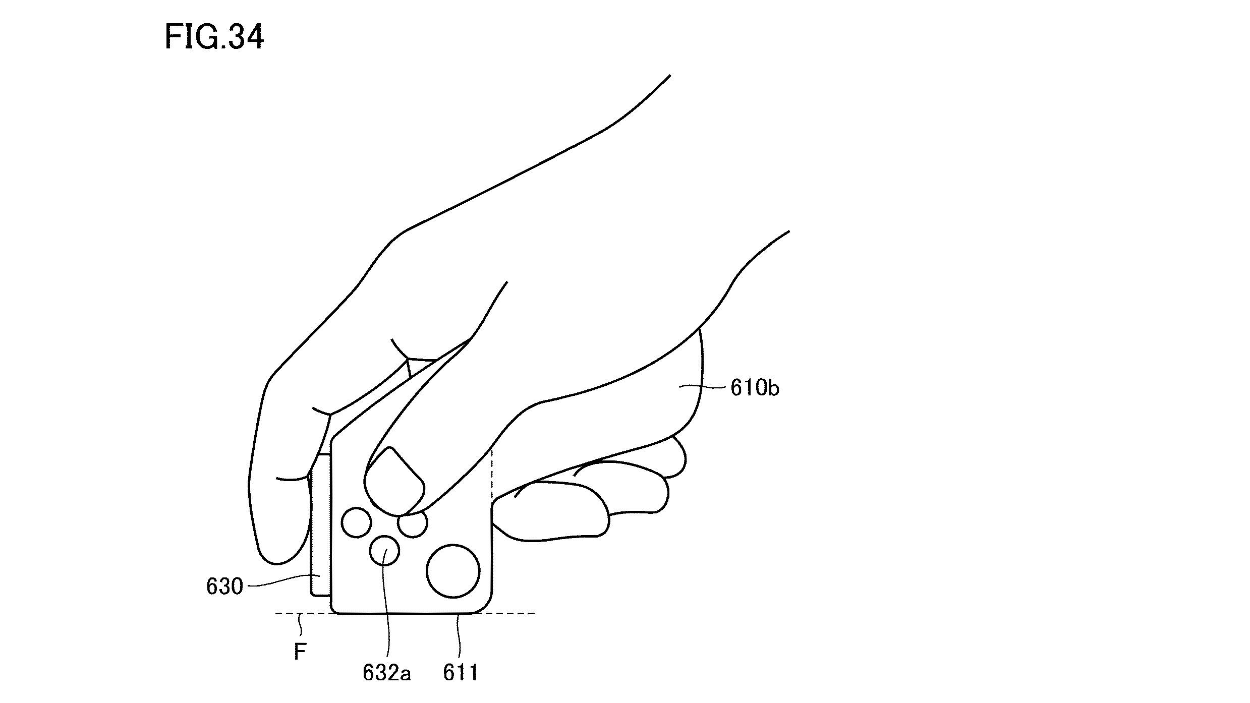 צילום מסך של פטנט בקר Nintendo Switch 2 עם בקר החזקת יד בצד