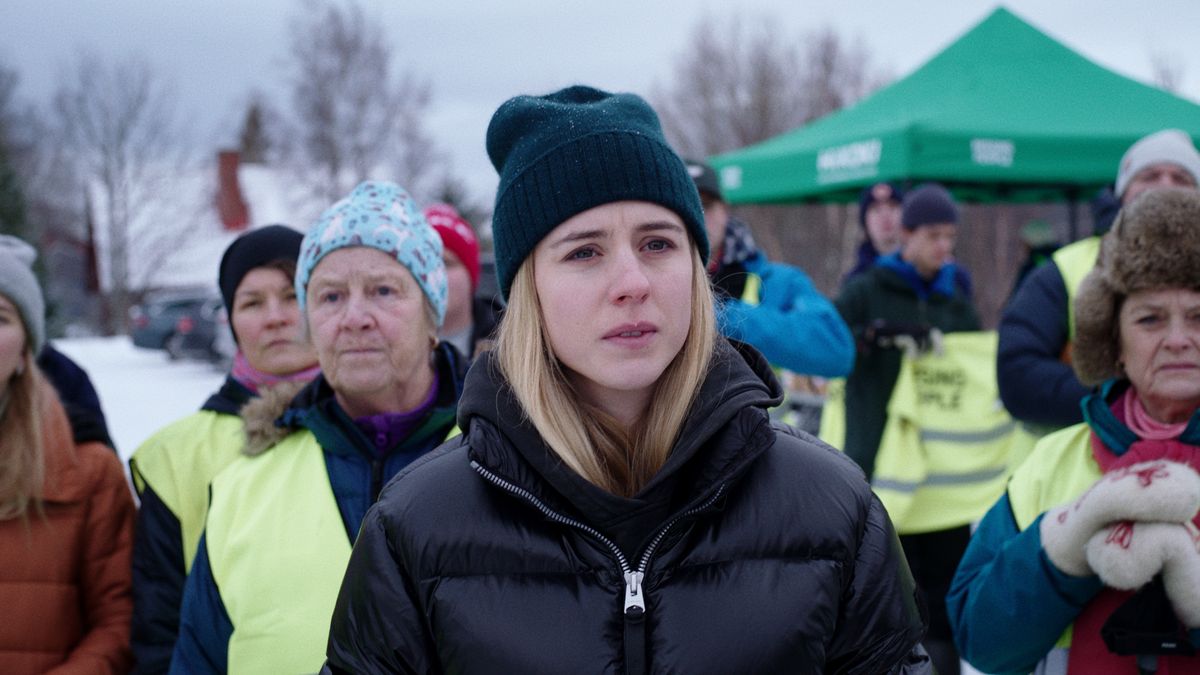 Hanna Ahlander (Carla Sehn) stands in a crowd in Netflix's "The Åre Murders"