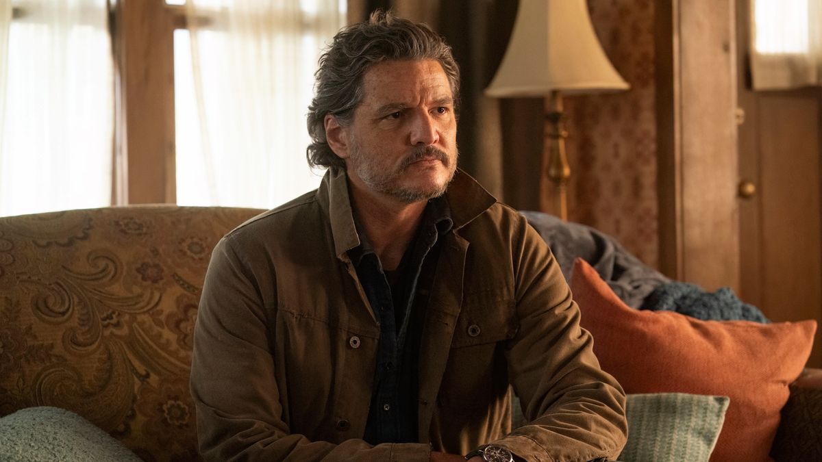 Joel (Pedro Pascal) sits on a sofa in HBO's "The Last Of Us" season 2