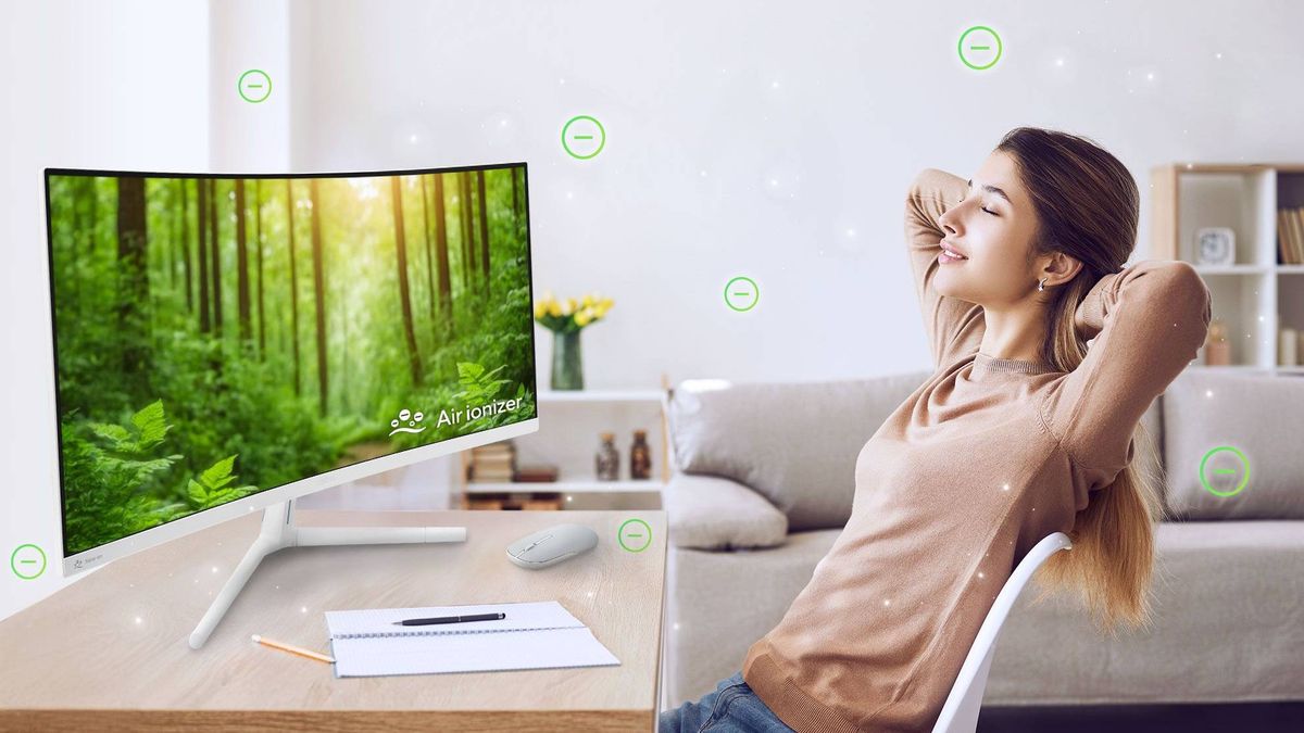 Asus VU Air Ionizer Monitor on desk with person relaxed in office chair
