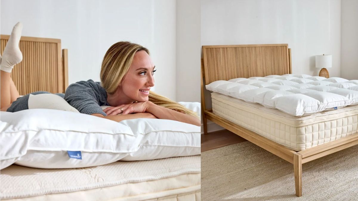 A blonde woman laying on her stomach on Naturepedic mattress topper on mattress with rattan headboard