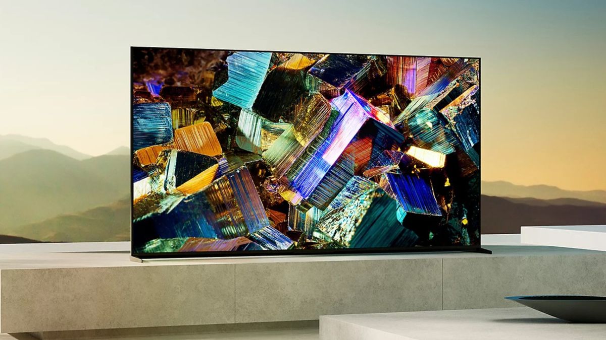 The Sony Z9K 8K TV displaying colorful geometric shapes in front of a mountainous landscape