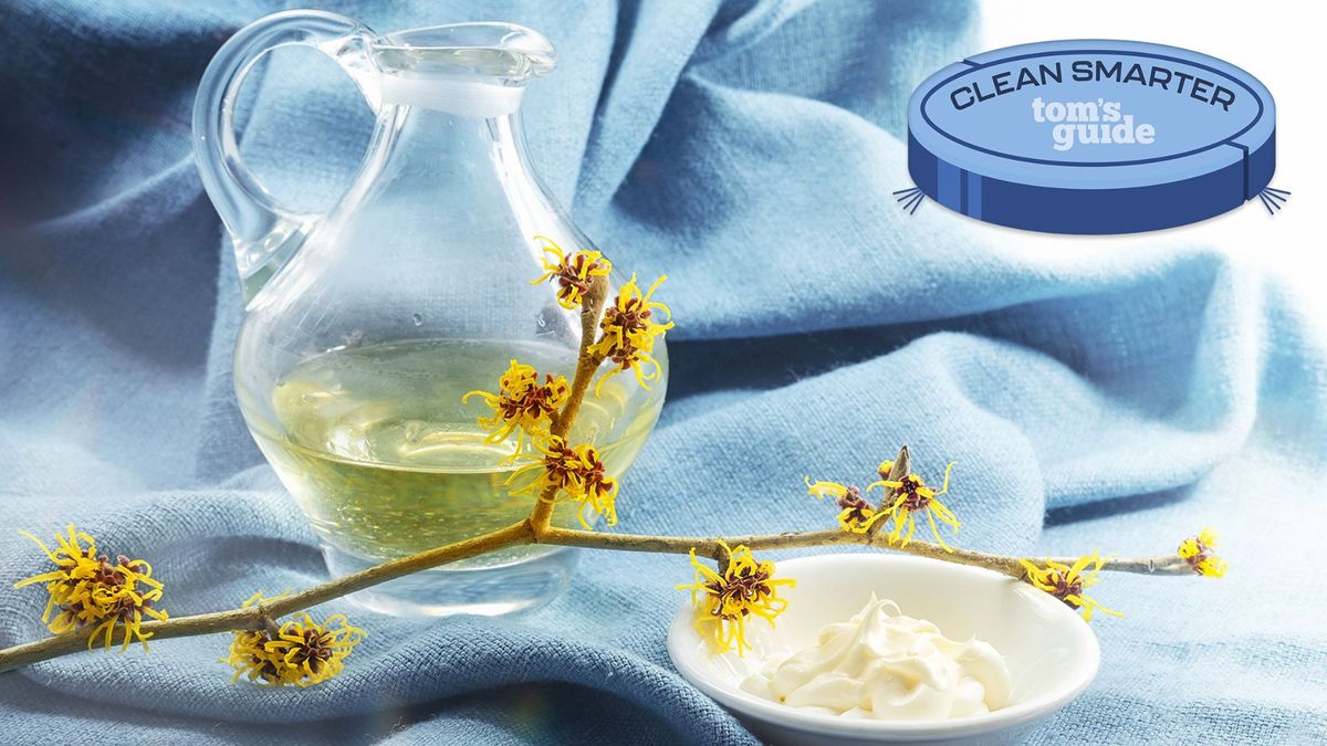 Witch hazel in a bottle with flower