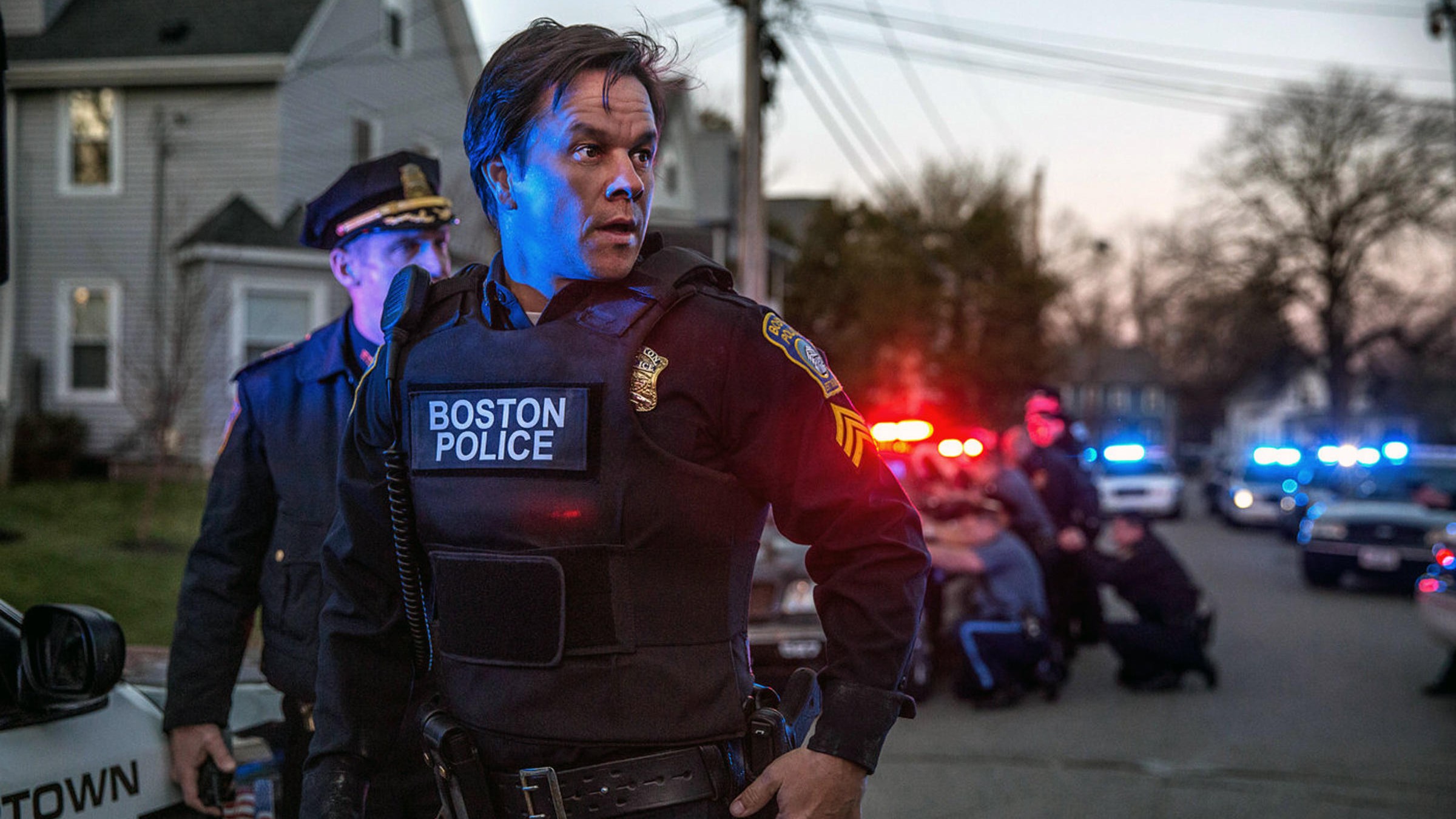 Tommy Saunders (Mark Wahlberg) in Boston PD uniform in a scene from "Patriot Days"