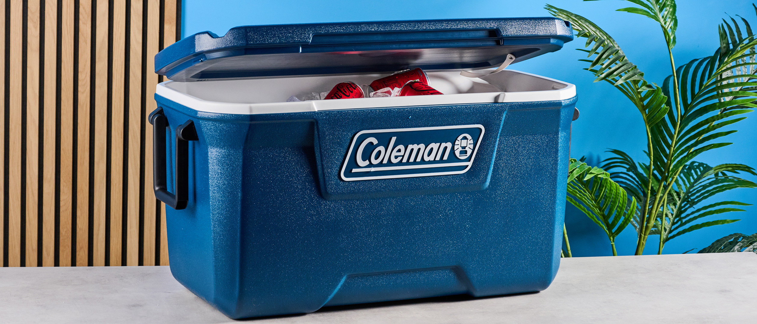 the coleman classic cooler coleman xtreme cooler in 54-quart in blue with a fish ruler and drinks holders on the lid and a drain tap