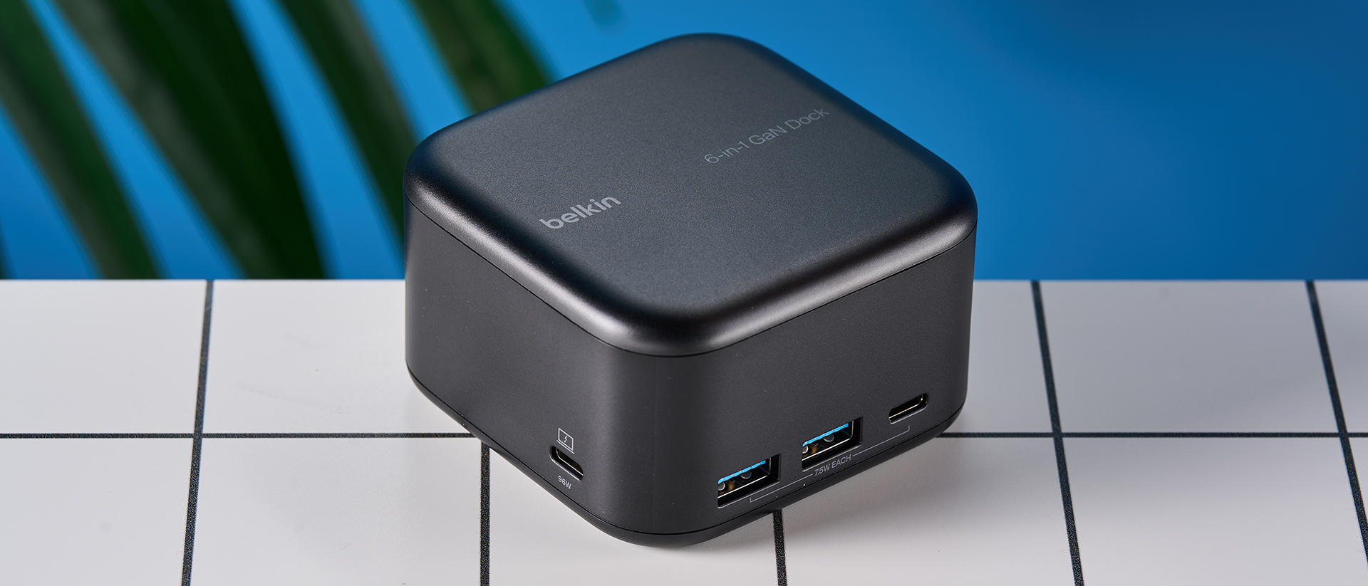 Belkin Connect USB-C Dock 6-in-1 Core GaN, 130W on a white surface with a blue background