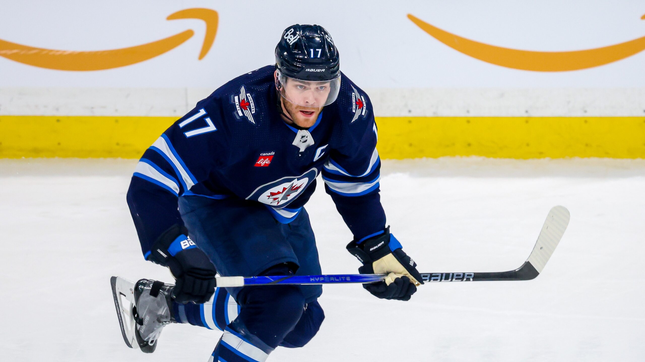 Adam Lowry #17 of the Winnipeg Jets skates during third period action ahead of the NHL Playoffs 2025. Photo by Jonathan Kozub/NHLI via Getty Images.