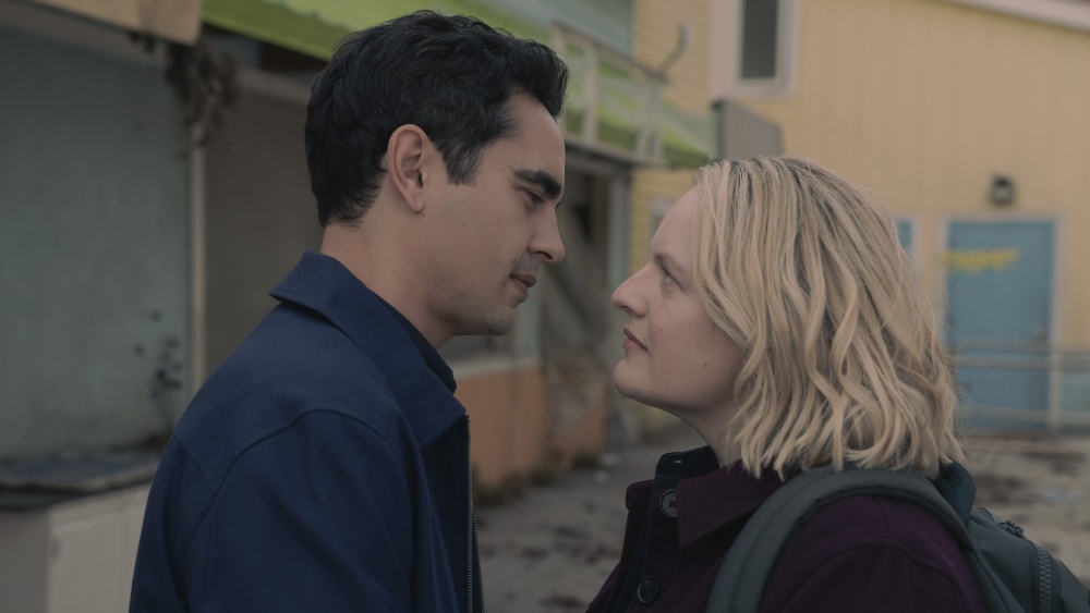 June Osborne (Elisabeth Moss) and Commander Nick Blaine (Max Minghella) stand face to face in The Handmaid's Tale season 6