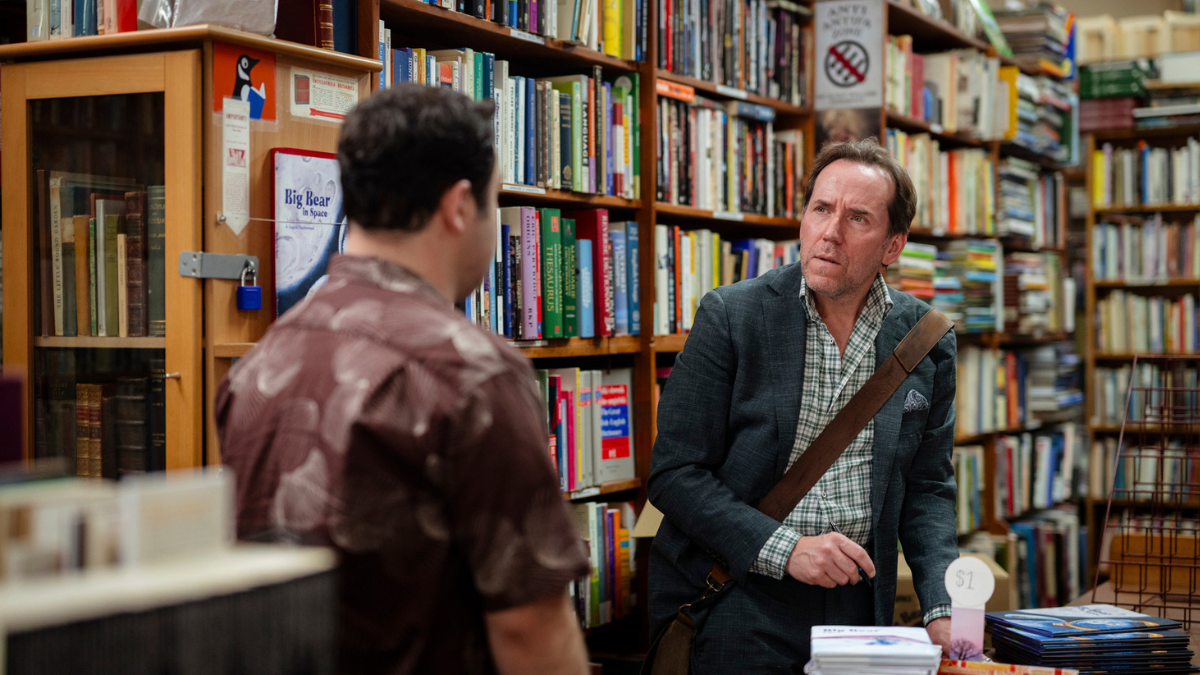 Austin (played by Michael Theo), left, has some interesting news for author Julian Hartswood (Ben Miller)