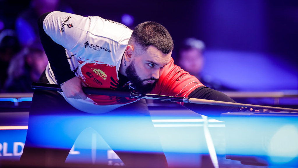 Eklent Kaci of Albania plays a shot in the quarter-final match against Mario He of Austria on day 3 of the 2023 World Pool Masters