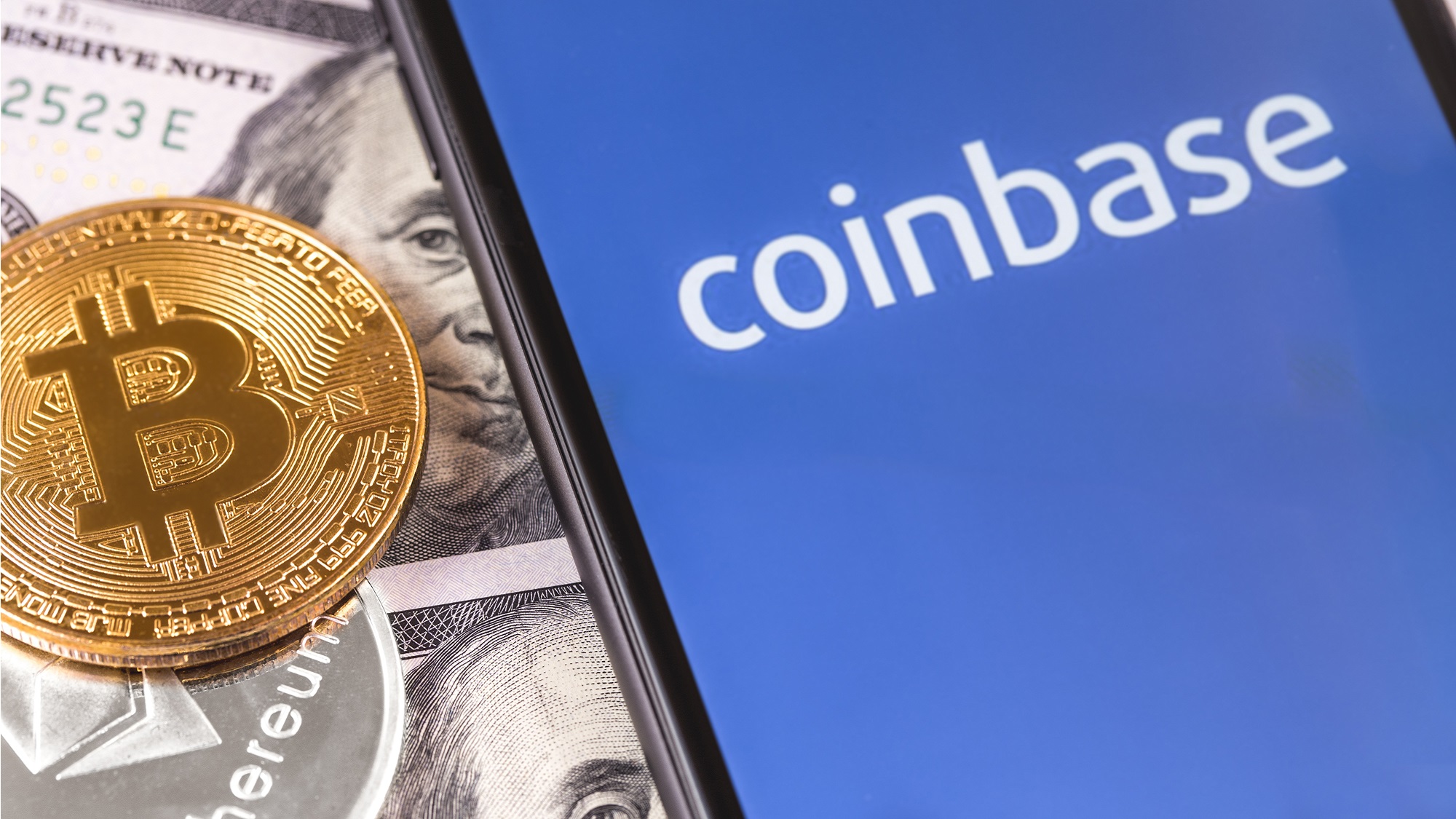 Coinbase logo on the screen.