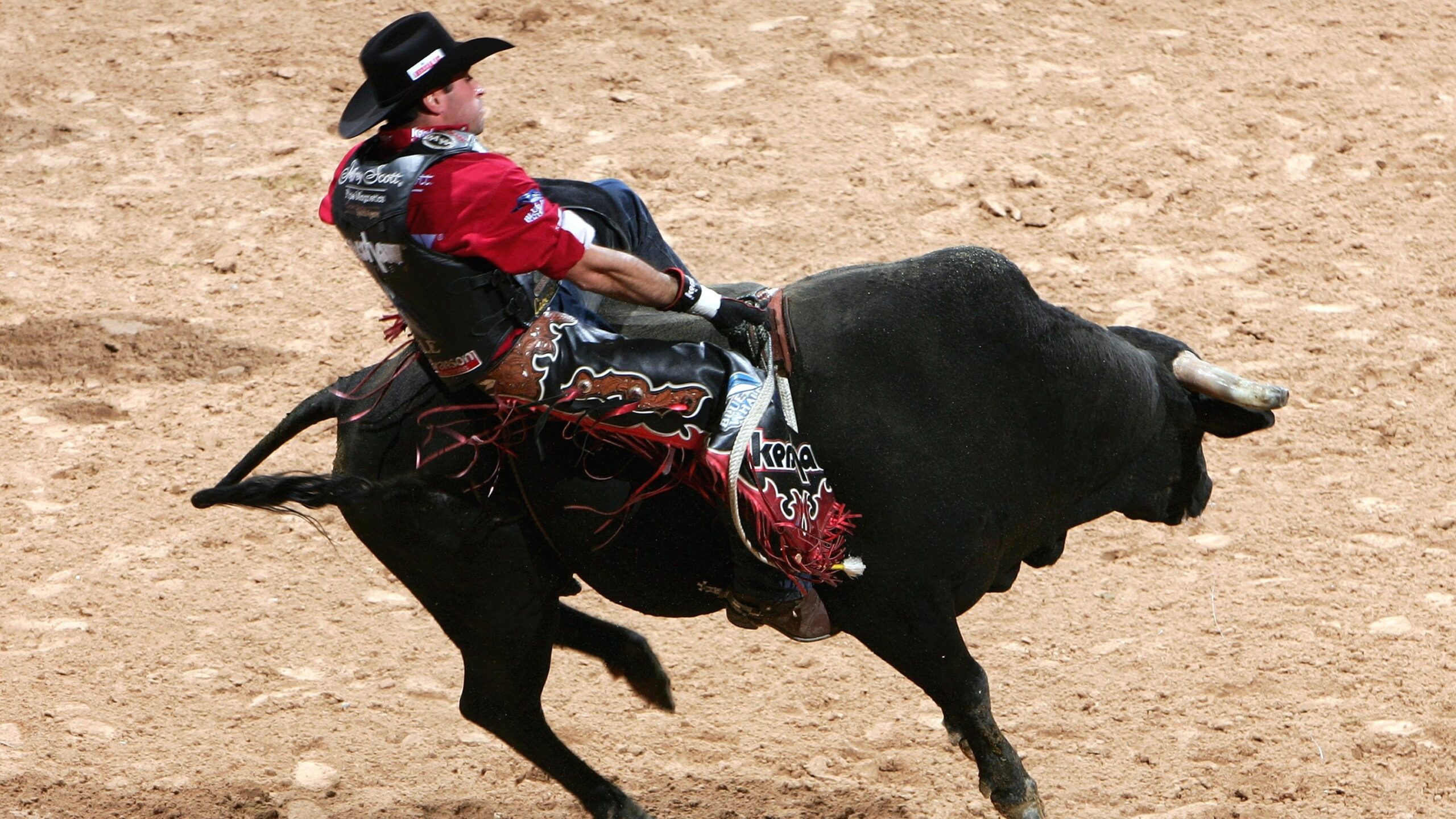 LAS VEGAS - OCTOBER 29: World Champion Guilherme Marchi of Brazil rides Jumpin Jack Flash during the Professional Bull Riders World Finals at Mandalay Bay Casino and Hotel October 29, 2006 in Las Vegas, Nevada. (Photo by Donald Miralle/Getty Images)