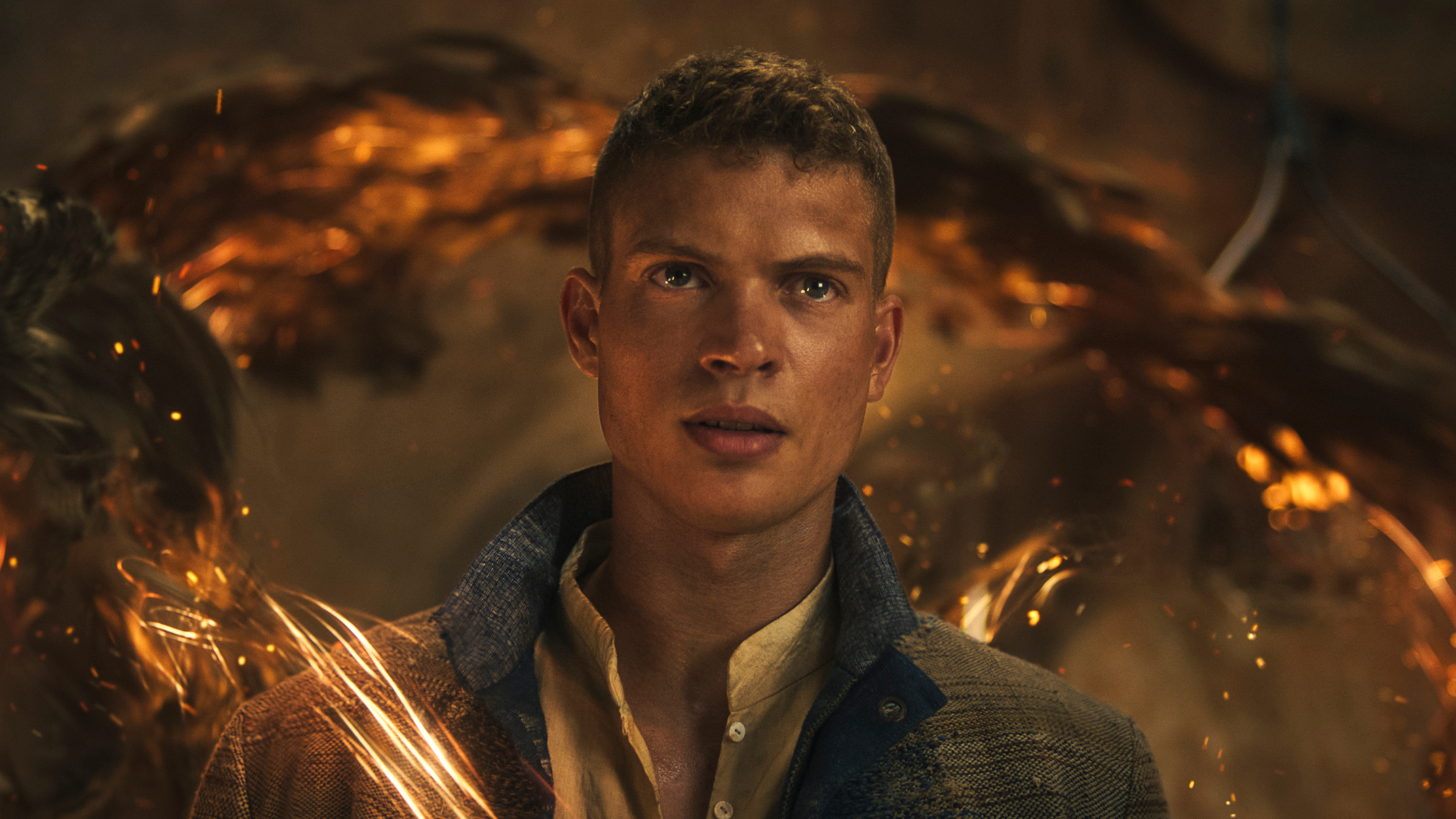 Rand (Josha Stradowski) surrounded by swirling elements of the One Power in a scene from "The Wheel of Time" season 3 finale
