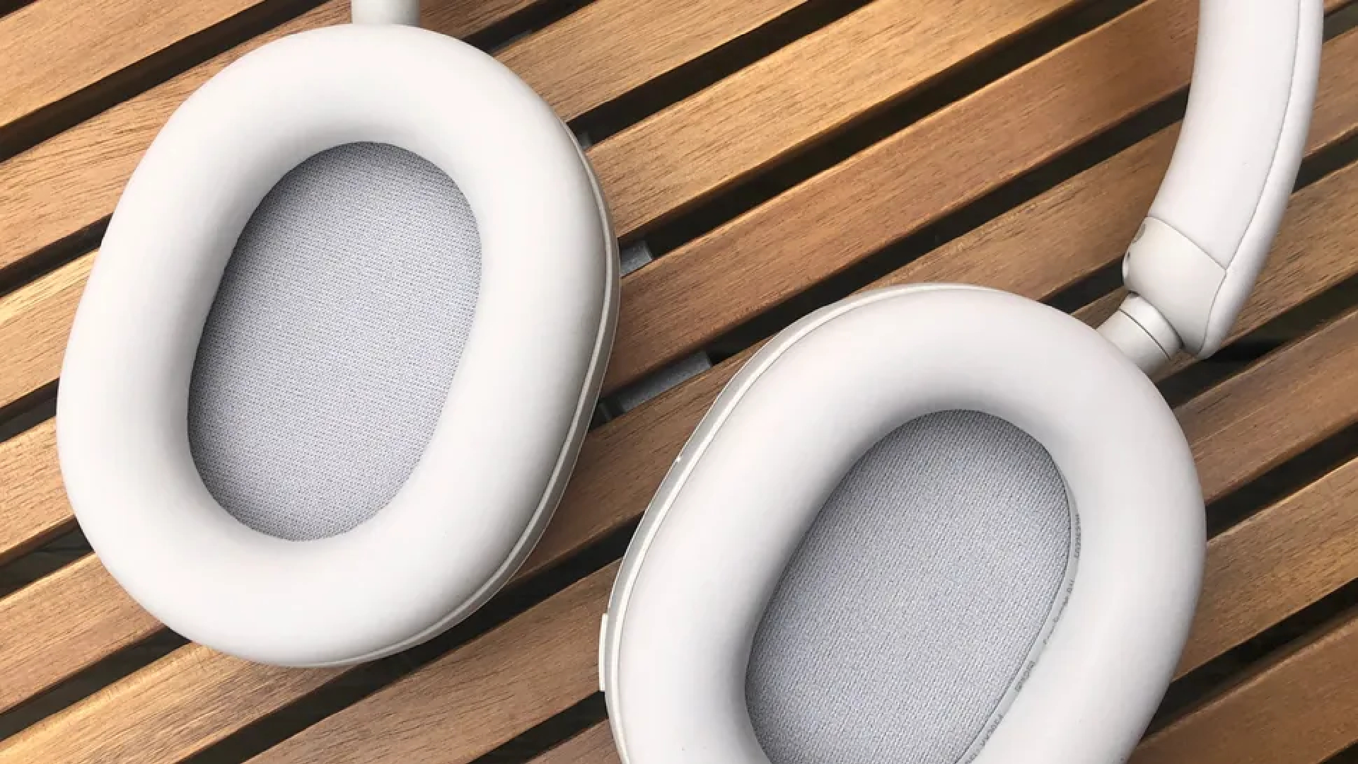 Sony XM5 headphones on table