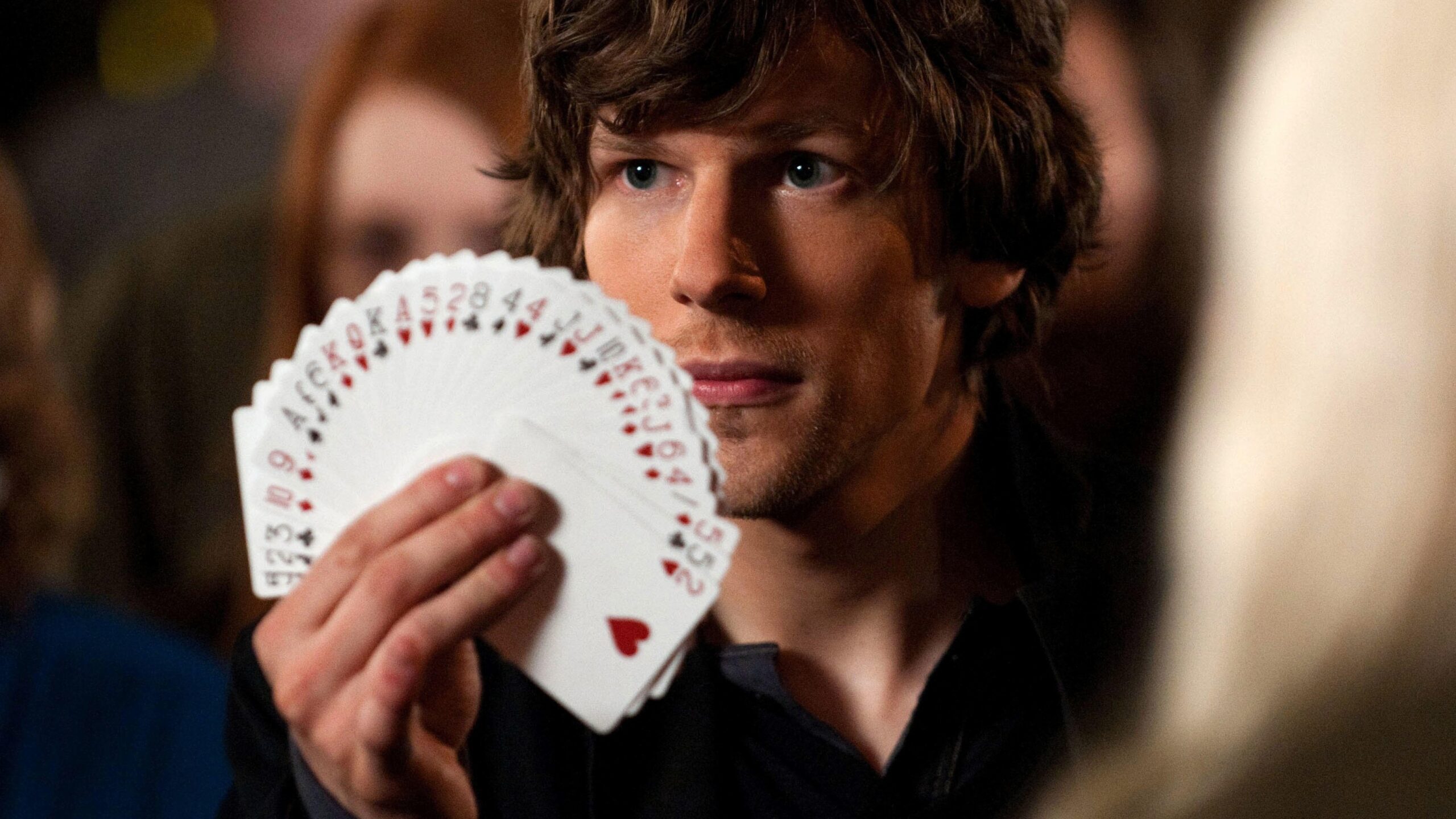 Daniel Atlas (Jesse Eisenberg) fans out a deck of cards in a scene from "Now You See Me"