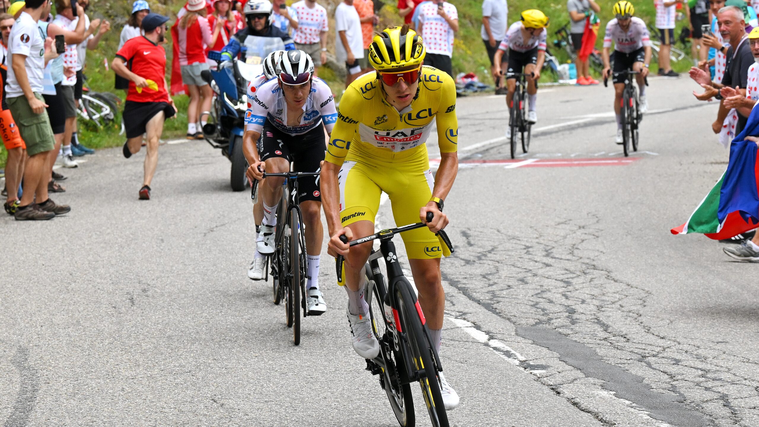Tadej Pogacar breaking away in Stage 19 of the 2024 Tour de France.