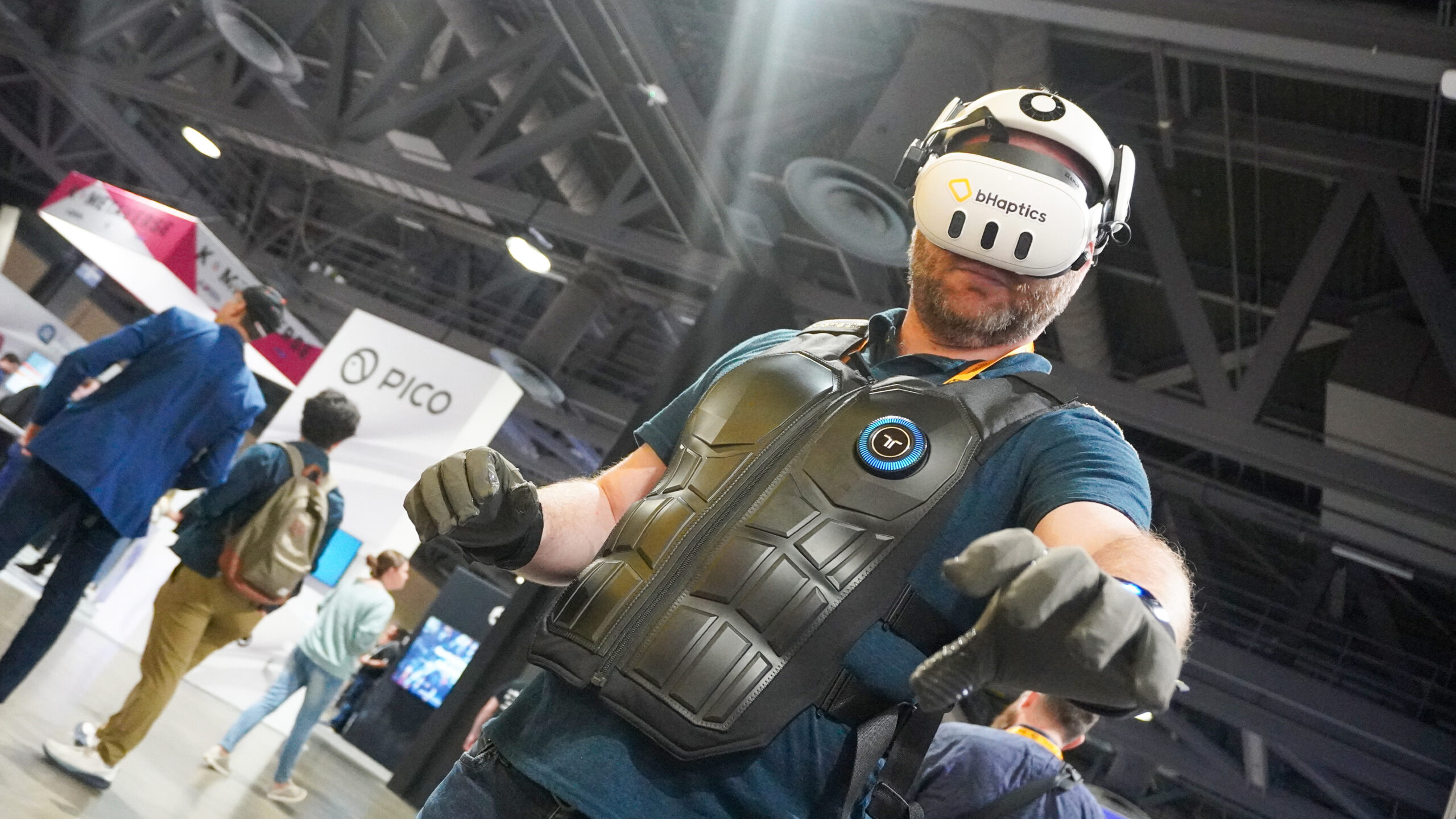 bHaptics Vr accessories: vest, gloves, sleeve with Meta headset at AWE 2025
