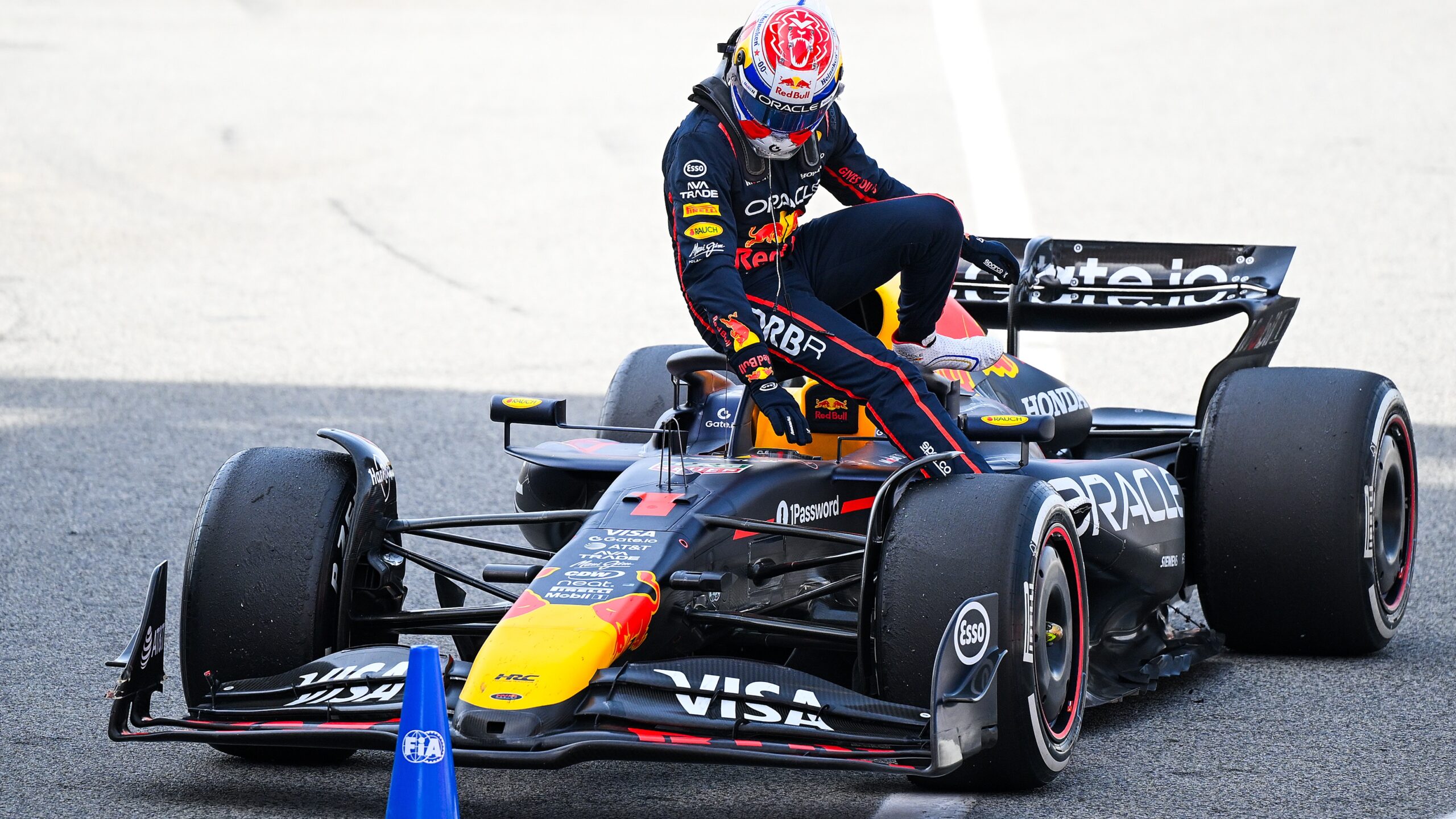 Max Verstappen gets off the RB21 after the Spanish Grand Prix.