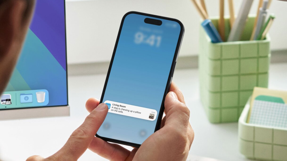 Phone showing Ring Video Descriptions AI feature.