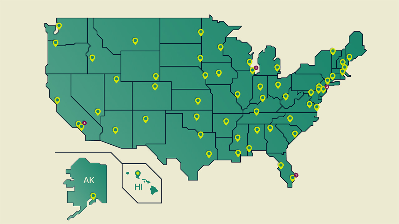 ExpressVPN graphic showing a server in every US state. There is a green map of the US, with the states outlined, and lime green markers detailing the location of each server