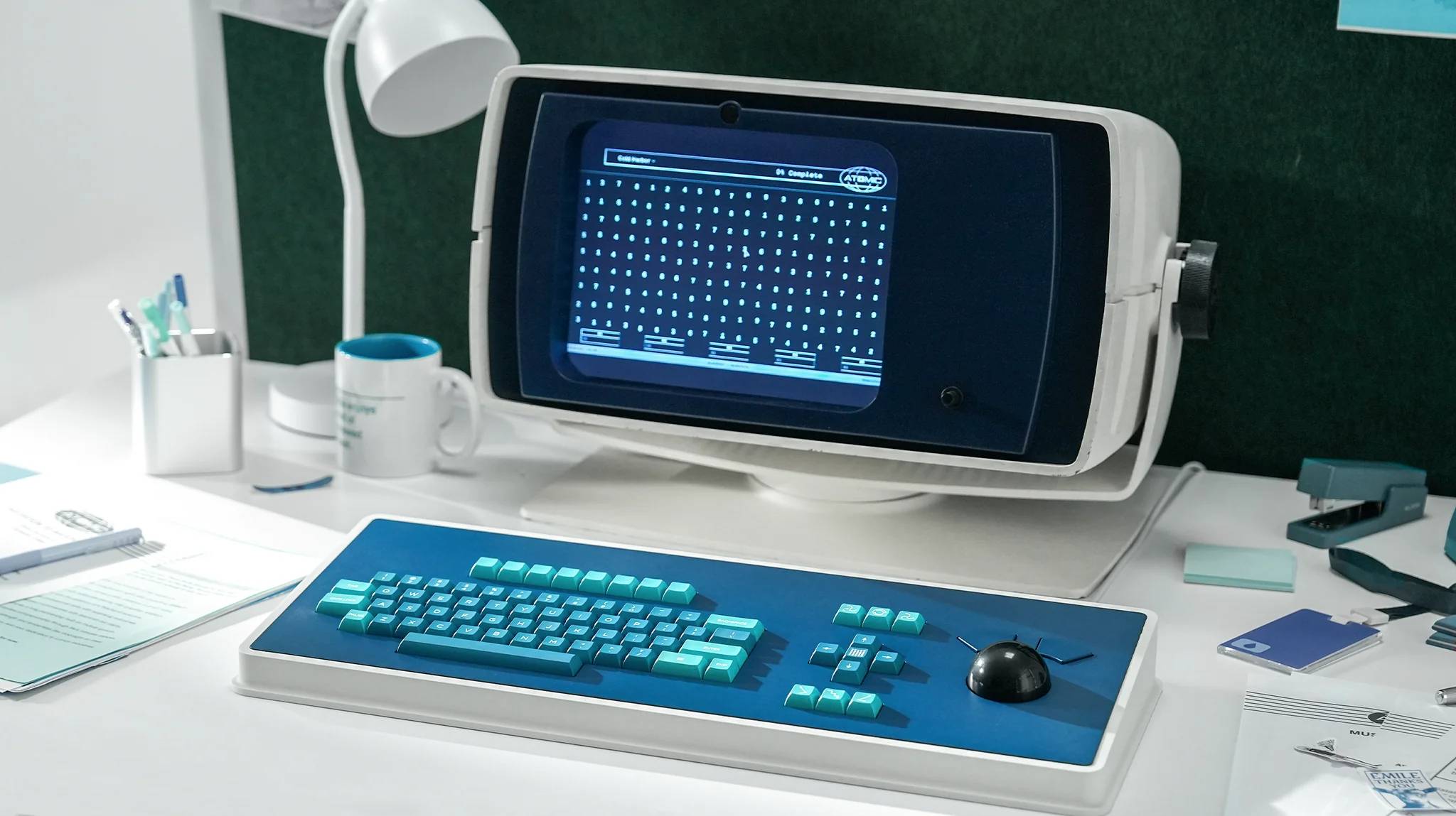 MDR Dasher Keyboard on desk with monitor inspired by Severance show
